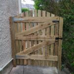 Timber side gate installation in Presto