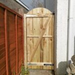 Timber side gate installation in Presto